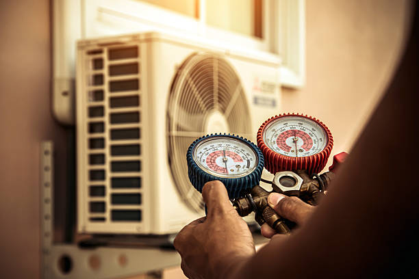 Professional Air Conditioning Service technician working in Murrayville, GA